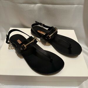 Aldo Black T-Strap Sandals with Gold Hardware